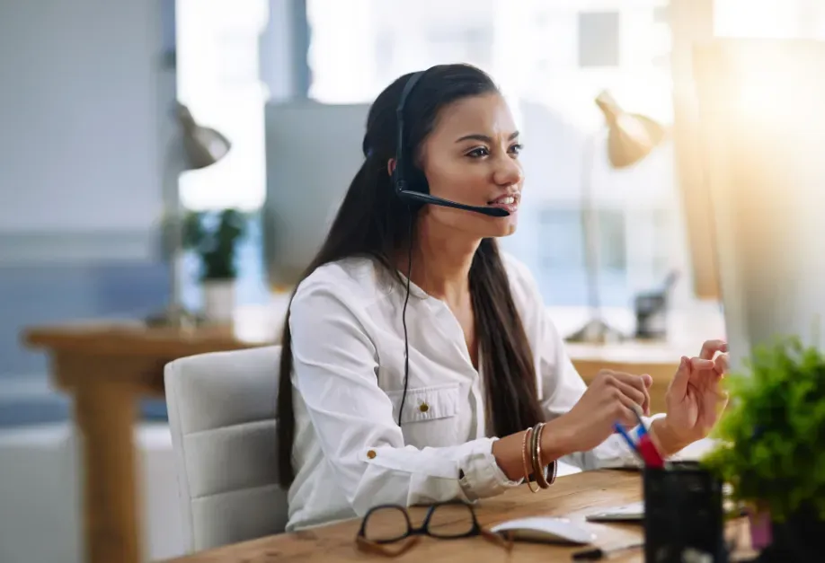 Smiling concierge on the phone