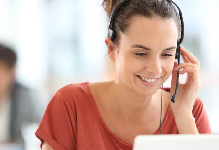 Female concierge on the phone